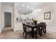 Dining area with table, chairs, and view of kitchen at 312 Lucaya Loop # B5/U312, Davenport, FL 33897