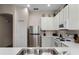 Well-equipped kitchen with stainless steel appliances at 312 Lucaya Loop # B5/U312, Davenport, FL 33897