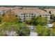 Aerial view of the apartment building and surrounding area at 3326 Robert Trent Jones Dr # 10102, Orlando, FL 32835