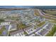Aerial view of houses near a lake at 4078 Malawi Trl, Saint Cloud, FL 34772
