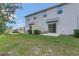 Private backyard with patio and view of the community at 4078 Malawi Trl, Saint Cloud, FL 34772
