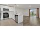 Modern kitchen featuring stainless steel appliances and light cabinetry at 4078 Malawi Trl, Saint Cloud, FL 34772