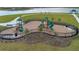 Community playground with a fenced area at 4078 Malawi Trl, Saint Cloud, FL 34772