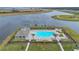 Resort-style pool with a lakeside view at 4078 Malawi Trl, Saint Cloud, FL 34772