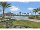 Community pool with lounge chairs and a gazebo at 4078 Malawi Trl, Saint Cloud, FL 34772
