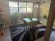 Bright dining area with large windows and stylish rug at 4235 Edgewater Dr, Orlando, FL 32804