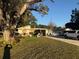 Ranch style home with mature landscaping and spacious yard at 4235 Edgewater Dr, Orlando, FL 32804
