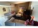 Spacious living room with comfortable seating and large TV at 4235 Edgewater Dr, Orlando, FL 32804