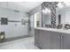 Beautiful bathroom featuring a glass-enclosed shower and double sink vanity at 4858 Stone Acres Cir, St Cloud, FL 34771