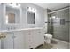 Stylish bathroom with a sleek vanity, shower, and neutral color palette at 4858 Stone Acres Cir, St Cloud, FL 34771