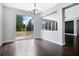 Elegant dining area with sliding glass doors offering backyard views and natural light at 4858 Stone Acres Cir, St Cloud, FL 34771