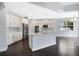 Spacious open kitchen featuring a large island, stainless steel appliances, and white cabinetry at 4858 Stone Acres Cir, St Cloud, FL 34771