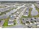 Aerial view of lakefront houses in a residential community at 5052 Center Ct, St Cloud, FL 34772