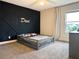 Cozy bedroom with a unique wall accent and kid-friendly bed at 5052 Center Ct, St Cloud, FL 34772