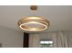 Elegant gold chandelier with LED lighting at 5052 Center Ct, St Cloud, FL 34772