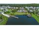 Community pool with a clubhouse and a wooden dock at 5052 Center Ct, St Cloud, FL 34772
