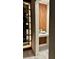 Charming hallway nook with sleek shelves, built-in lighting, and a stylish wood accent wall at 5052 Center Ct, St Cloud, FL 34772