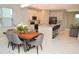 Modern kitchen with white cabinets, an island, and stainless steel appliances at 5052 Center Ct, St Cloud, FL 34772