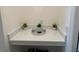 Clean laundry room with built-in shelves and countertop at 5052 Center Ct, St Cloud, FL 34772