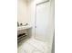 Convenient laundry area with white cabinets and built-in shelving at 5052 Center Ct, St Cloud, FL 34772