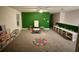 Spacious playroom features ample storage, a colorful rug, and a fun learning area at 5052 Center Ct, St Cloud, FL 34772