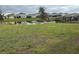 Residential neighborhood with a pond and houses at 5052 Center Ct, St Cloud, FL 34772