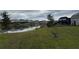 Waterfront property with pond view and lush greenery at 5052 Center Ct, St Cloud, FL 34772
