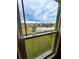 Scenic pond view from window overlooking homes at 5052 Center Ct, St Cloud, FL 34772