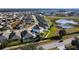 Aerial view of home and neighborhood, near lake at 524 Sardinia Cir, Davenport, FL 33837