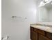 Clean bathroom with dark brown vanity and granite countertop at 524 Sardinia Cir, Davenport, FL 33837