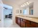 Double vanity bathroom with granite countertops at 524 Sardinia Cir, Davenport, FL 33837