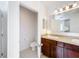 Bathroom with double vanity and granite countertop at 524 Sardinia Cir, Davenport, FL 33837