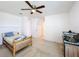 Light bedroom with ceiling fan and access to hallway at 524 Sardinia Cir, Davenport, FL 33837