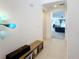 View down hallway showcasing access to living room at 524 Sardinia Cir, Davenport, FL 33837