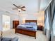 Spacious main bedroom with a large bed and walk-in closet at 524 Sardinia Cir, Davenport, FL 33837