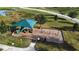 Community playground with shade structure at 524 Sardinia Cir, Davenport, FL 33837