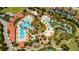 Aerial view of resort-style pool and community amenities at 5505 Misty Oak Cir, Davenport, FL 33837