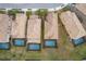 Aerial view showcasing multiple houses with private pools at 5505 Misty Oak Cir, Davenport, FL 33837