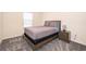 Cozy bedroom with a double bed and nightstand at 5505 Misty Oak Cir, Davenport, FL 33837