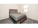Cozy bedroom with carpeted floor and neutral decor at 5505 Misty Oak Cir, Davenport, FL 33837