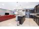Modern kitchen with stainless steel appliances and granite countertops at 5505 Misty Oak Cir, Davenport, FL 33837