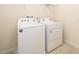 Convenient laundry room with washer and dryer at 5505 Misty Oak Cir, Davenport, FL 33837