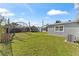 Spacious backyard with playset and trampoline at 7804 Acadian Dr, Orlando, FL 32822