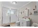 Clean bathroom with shower stall, toilet and white vanity at 7804 Acadian Dr, Orlando, FL 32822