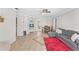 Living room featuring a grey sectional sofa and dining set at 7804 Acadian Dr, Orlando, FL 32822