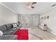 Living room with grey sectional sofa and red rug at 7804 Acadian Dr, Orlando, FL 32822