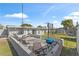 Concrete patio with seating area and grill at 7804 Acadian Dr, Orlando, FL 32822