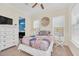 Cozy bedroom with a comfortable bed and plenty of natural light at 8162 Valhalla Ter, Reunion, FL 34747