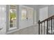 Bright entryway with double doors and tiled floors at 8162 Valhalla Ter, Reunion, FL 34747