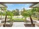 Landscaped front yard with walkway leading to house entrance at 8162 Valhalla Ter, Reunion, FL 34747